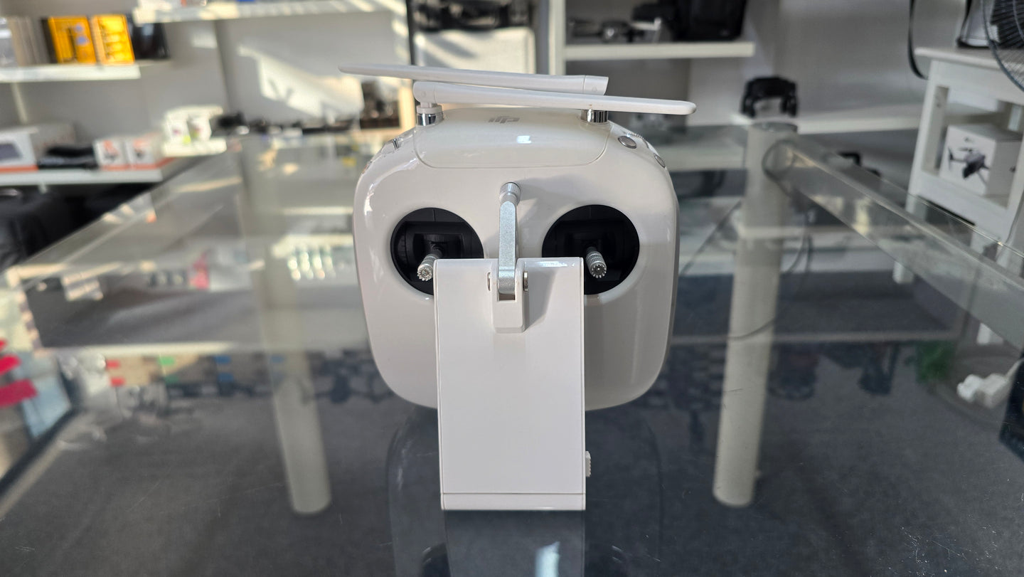 Pre-Owned DJI Phantom 3 & 4 GL300C Controller shown from the front, designed for Phantom 3 and 4 drones, available for purchase.