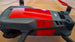 DJI drone with highly reflective red tape to deter bird attacks and enhance visibility.