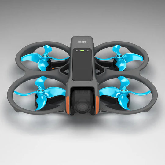 DJI Avata 2 drone with blue upgrade propellers for low-noise flight and improved agility.