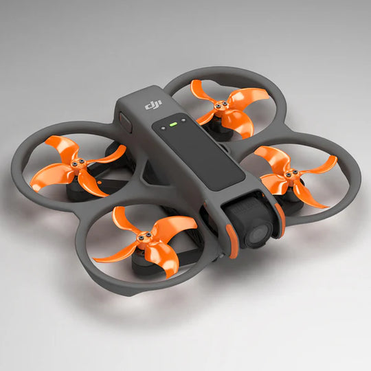 DJI Avata 2 drone with orange STEALTH upgrade propellers, designed for low-noise and enhanced performance.