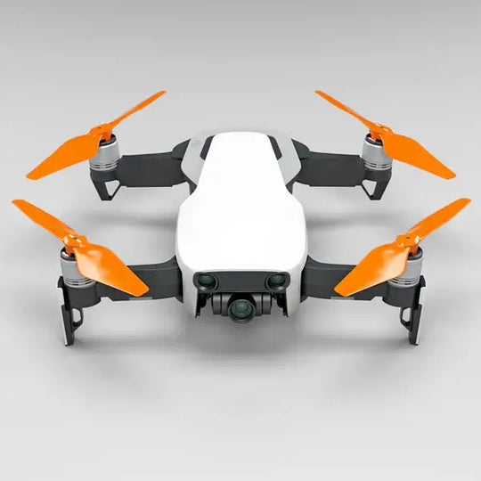 DJI Mavic Air drone with STEALTH upgrade propellers in orange for improved performance and quiet operation.