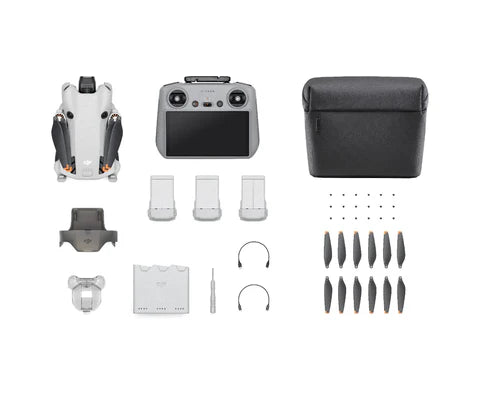 DJI Mini 4 Pro Flymore Combo Plus components including drone, remote, batteries, and accessories in a laid-out arrangement.