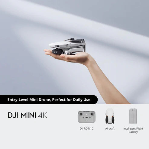 DJI Mini 4K drone in hand, showcasing its compact design for beginners and daily use.