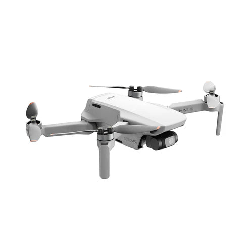 DJI Mini 4K drone with propellers, designed for easy aerial photography and compact portability.