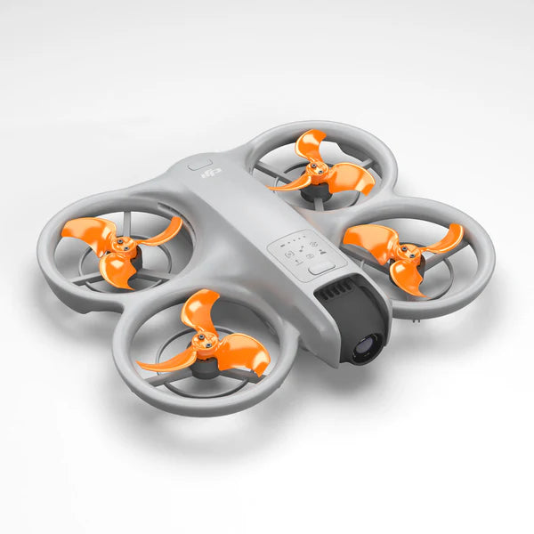 DJI Neo drone with orange STEALTH upgrade propellers on a gray body, designed for silent and efficient flight.