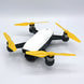 DJI Spark drone with STEALTH upgrade yellow propellers for improved flight performance and reduced noise.