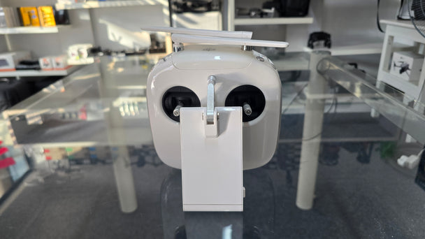 Pre-Owned DJI Phantom 3 & 4 GL300C Controller shown from the front, designed for Phantom 3 and 4 drones, available for purchase.