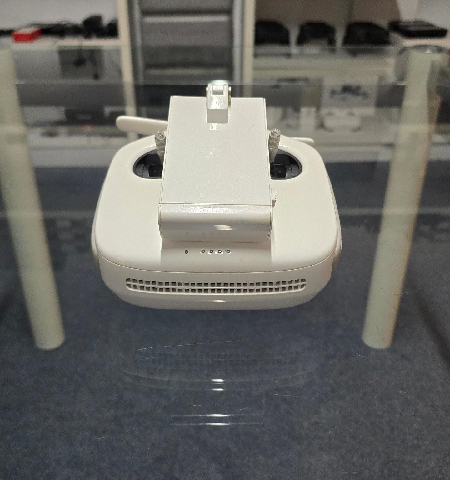 Pre-Owned DJI Phantom 4 Pro V2 Controller on display, ideal for enhancing your drone flying experience.